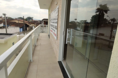 CAS261326 Casa em Itanhaém com 2 suítes e piscina com cascata financiada